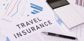 travel insurance concept, documents on the desktop